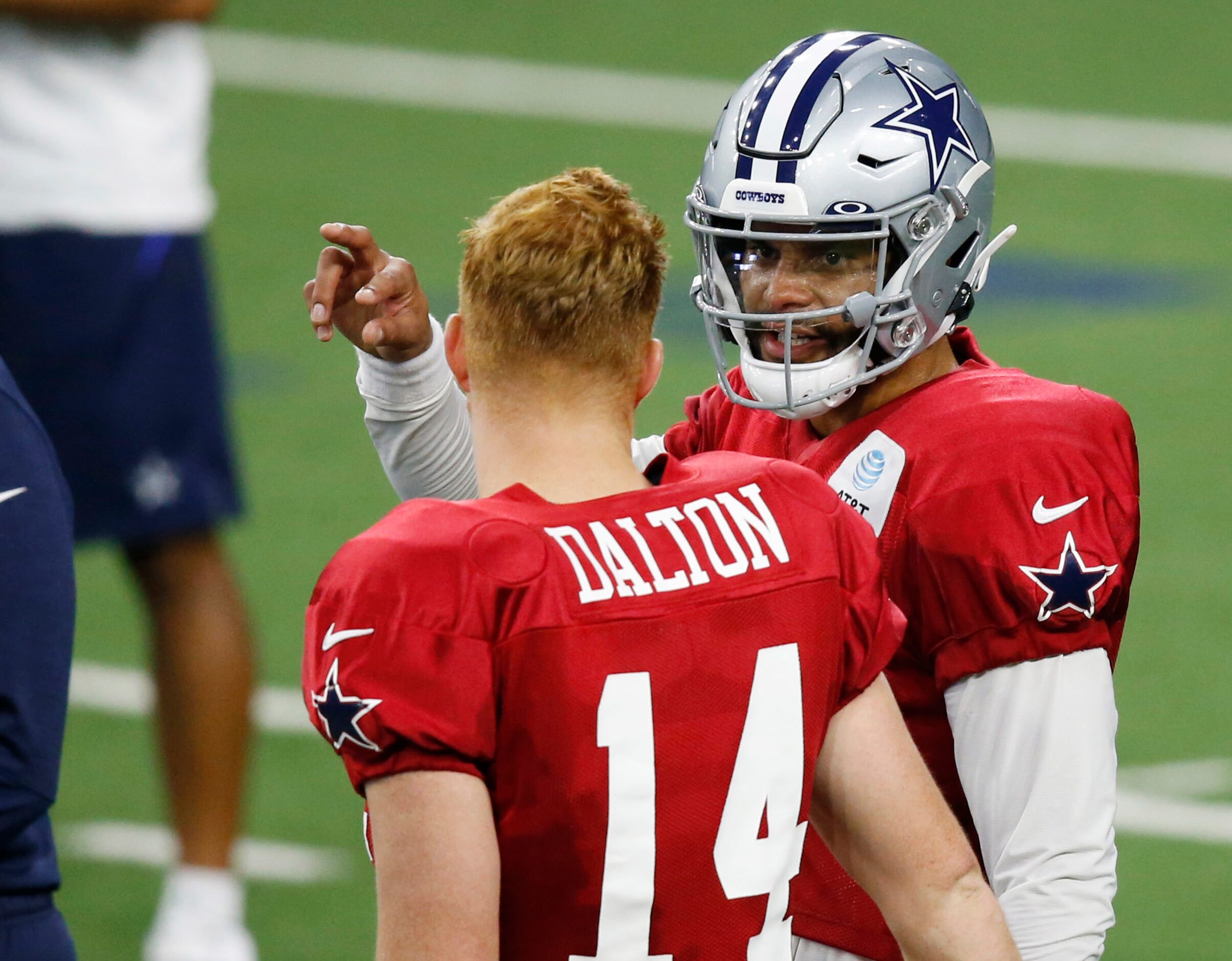 Dallas Cowboys quarterback Dak Prescott (4) and Dallas Cowboys quarterback Andy Dalton (14)...