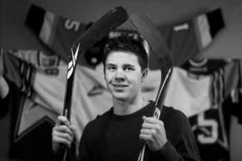  Colin Jacobs, a 17-year-old hockey standout from Coppell, is playing his second full season...