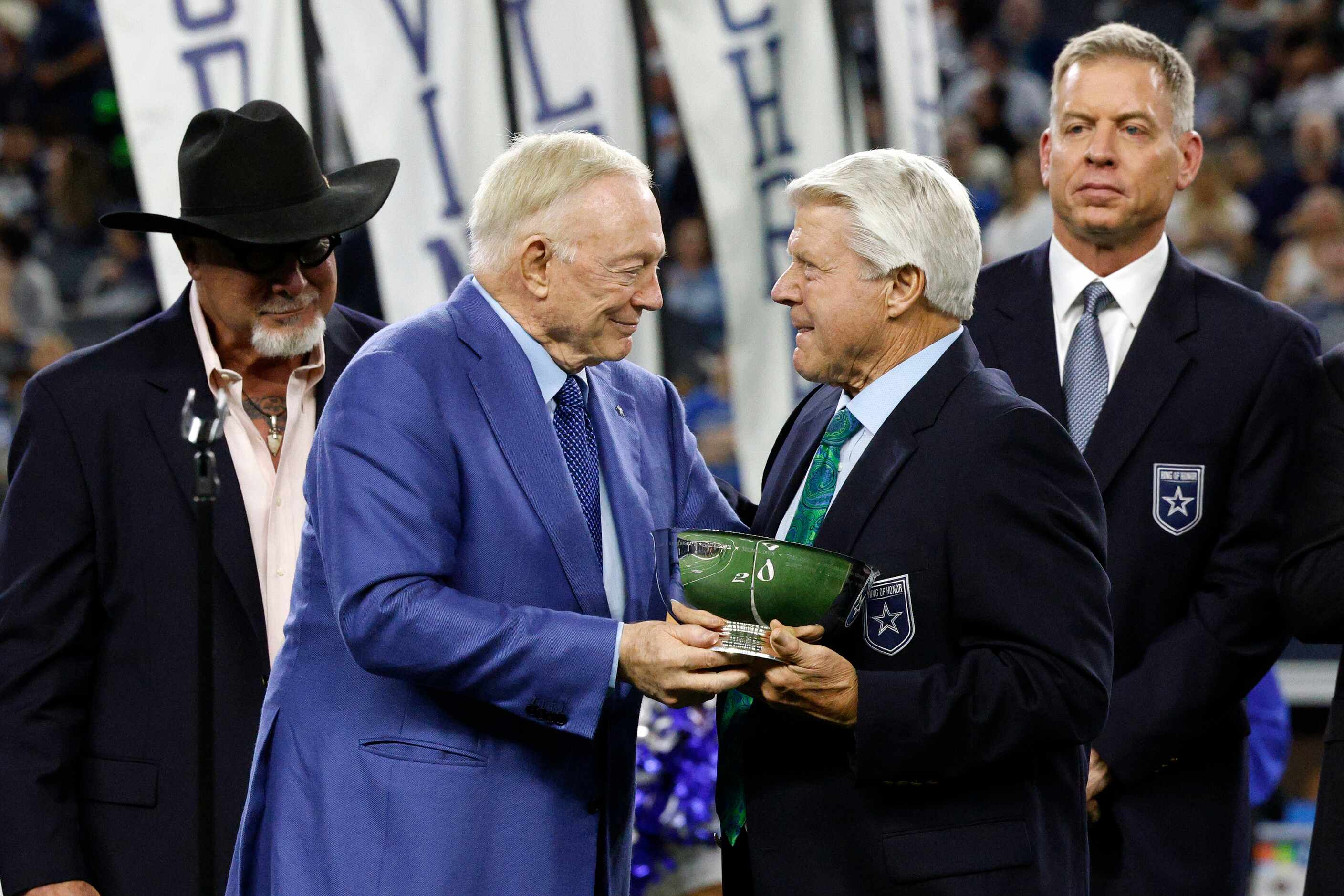Dallas Cowboys owner Jerry Jones presents former Cowboys coach Jimmy Johnson with a Ring of...