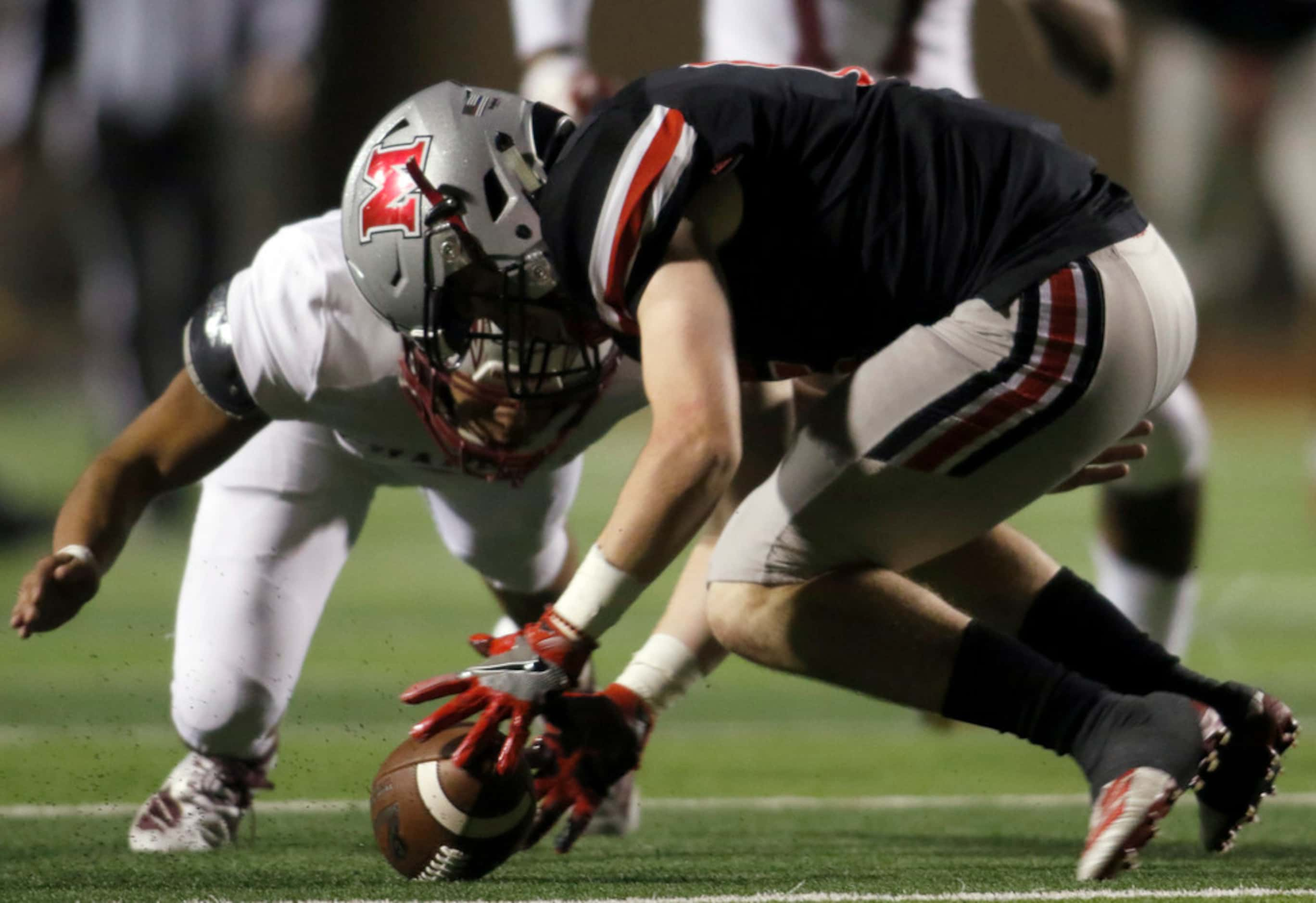 Flower Mound Marcus receiver Alex Fontaine (6) reaches to recover a fumbled punt as Keller...