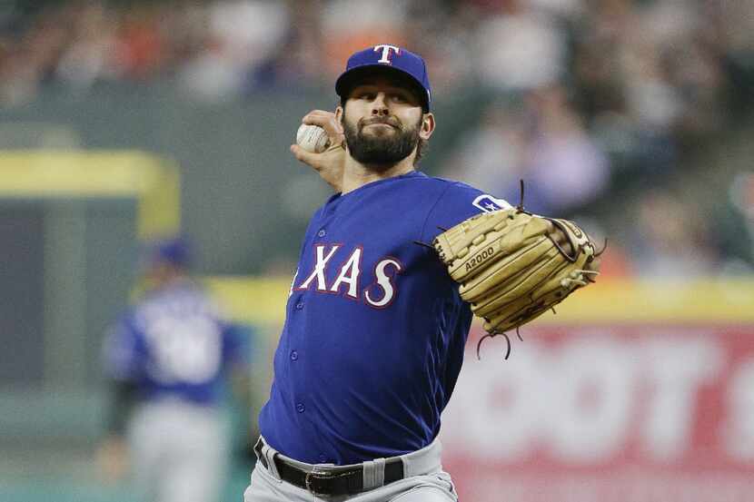 HOUSTON, TX - MAY 03:  Nick Martinez #22 of the Texas Rangers pitches in the first inning...
