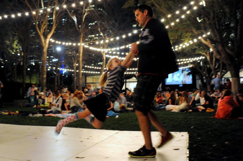 Derek and daughter Brooklyn Reaves dance to old-school tunes at the Nasher on Friday night...
