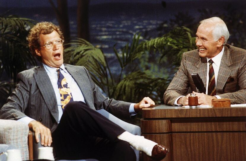 David Letterman talks with host Johnny Carson during taping of "The Tonight Show" in 1991.