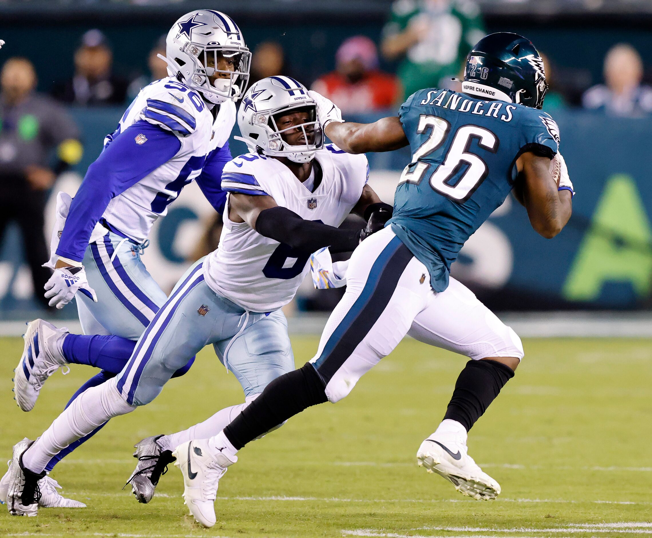 Dallas Cowboys safety Donovan Wilson (6) attempts to tackle Philadelphia Eagles running back...