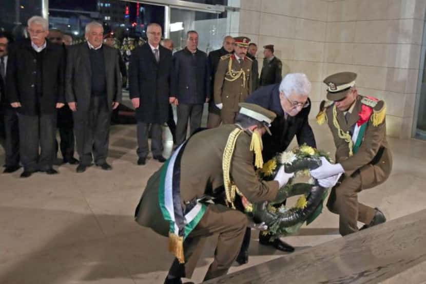 
Palestinian President Mahmoud Abbas lays a wreath on Fatah founder Yasser Arafat’s tomb in...