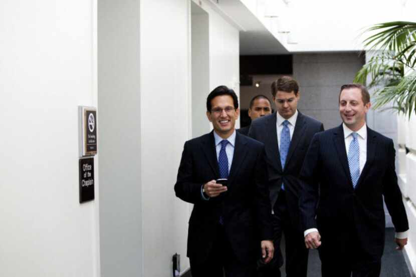 House Majority Leader Eric Cantor (R-Va.) heads to a House Republican meeting to discuss...