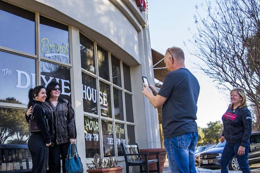 
Ray Wright took a photo of Lorena Davey (left) and Kat Guyon in front of the Dixie House on...