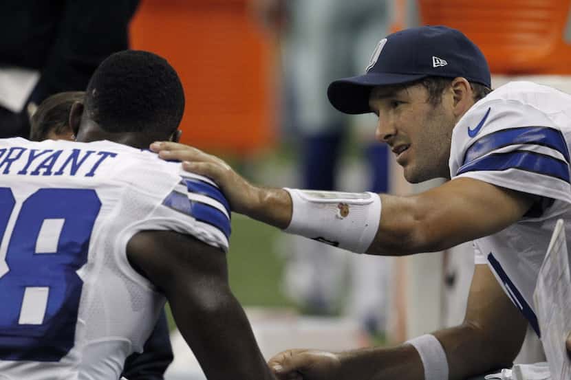 Dallas Cowboys wide receiver Dez Bryant (88) and Dallas Cowboys quarterback Tony Romo (9)...
