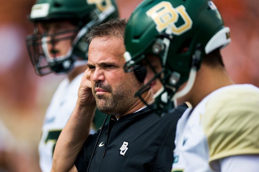 Baylor Bears head coach Matt Rhule watches from the sidelines during the first quarter of a...