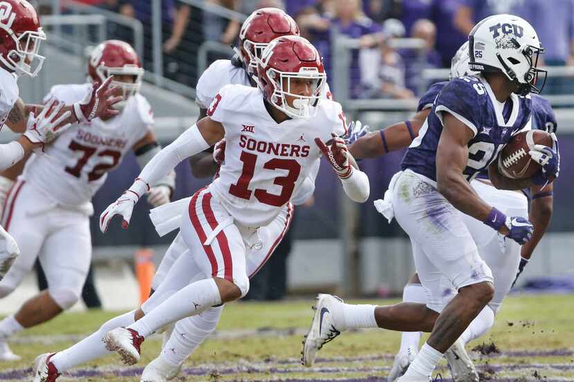 FILE - TCU wide receiver KaVontae Turpin (25) heads upfield for yardage after a catch as a...