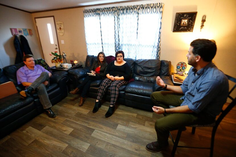 Deanna Staton (left) and Kati Wall listen to one of their lawyers Jamal Alsaffar at Kati's...