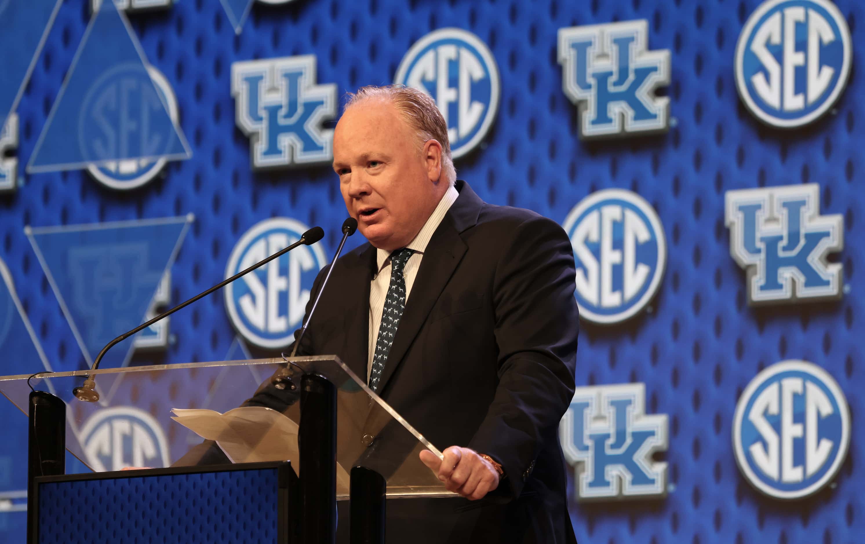 Kentucky head football coach Mark Stoops answers a question from a media member during the...