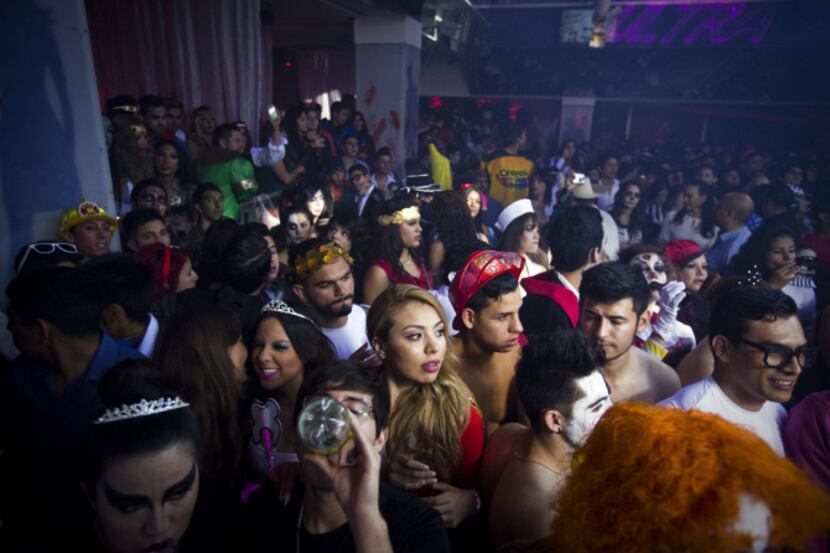 Seems like old times? A bus service brought Halloween partygoers from El Paso to a nightclub...