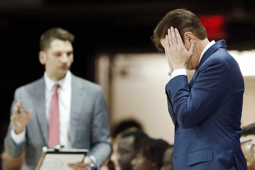 SMU head coach Tim Jankovich reacts to a missed call during the first half of a mens NCAA...