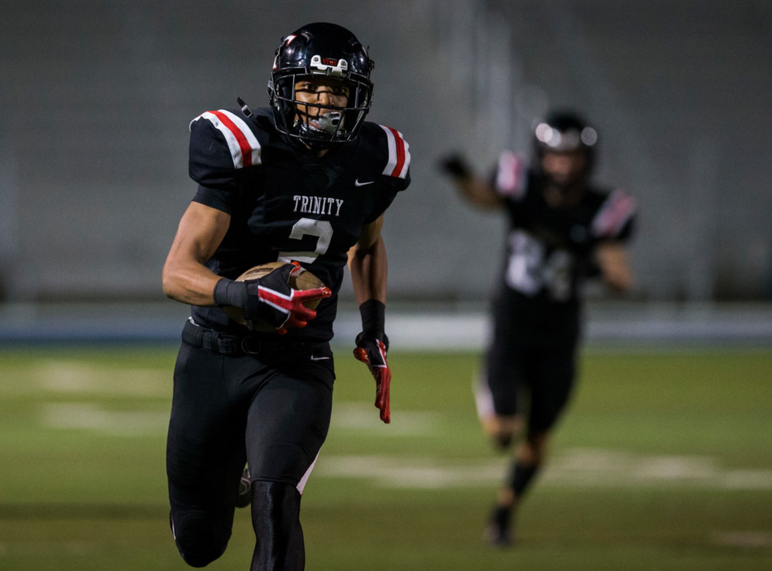 Euless Trinity running back Ollie Gordon (2) runs to the end zone for a touchdown after...