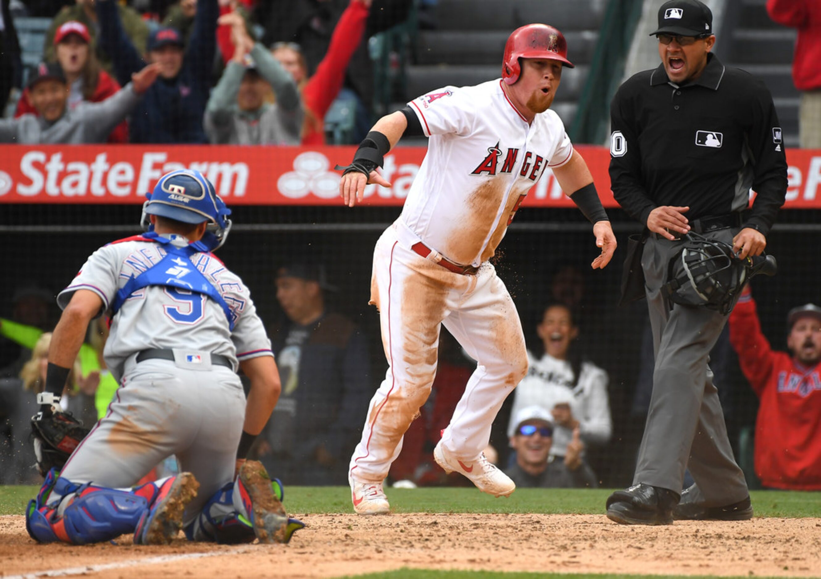 ANAHEIM, CA - MAY 26:  Kole Calhoun #56 of the Los Angeles Angels of Anaheim celebrates as...