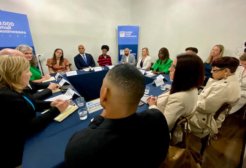 Democratic Rep. Colin Allred (center, back row) met with a group of small-business owners...