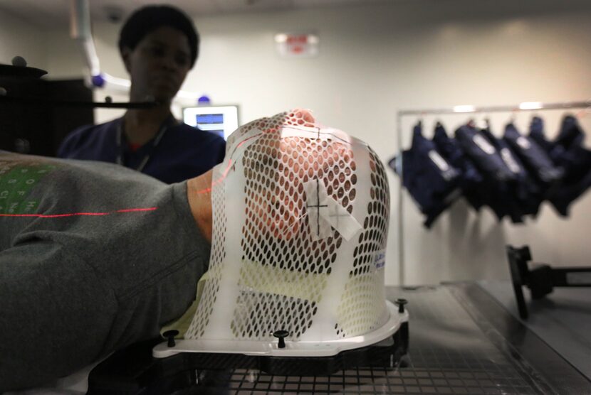 Weiss gets prepped for his radiation treatment at the hospital. (Louis DeLuca/Staff...