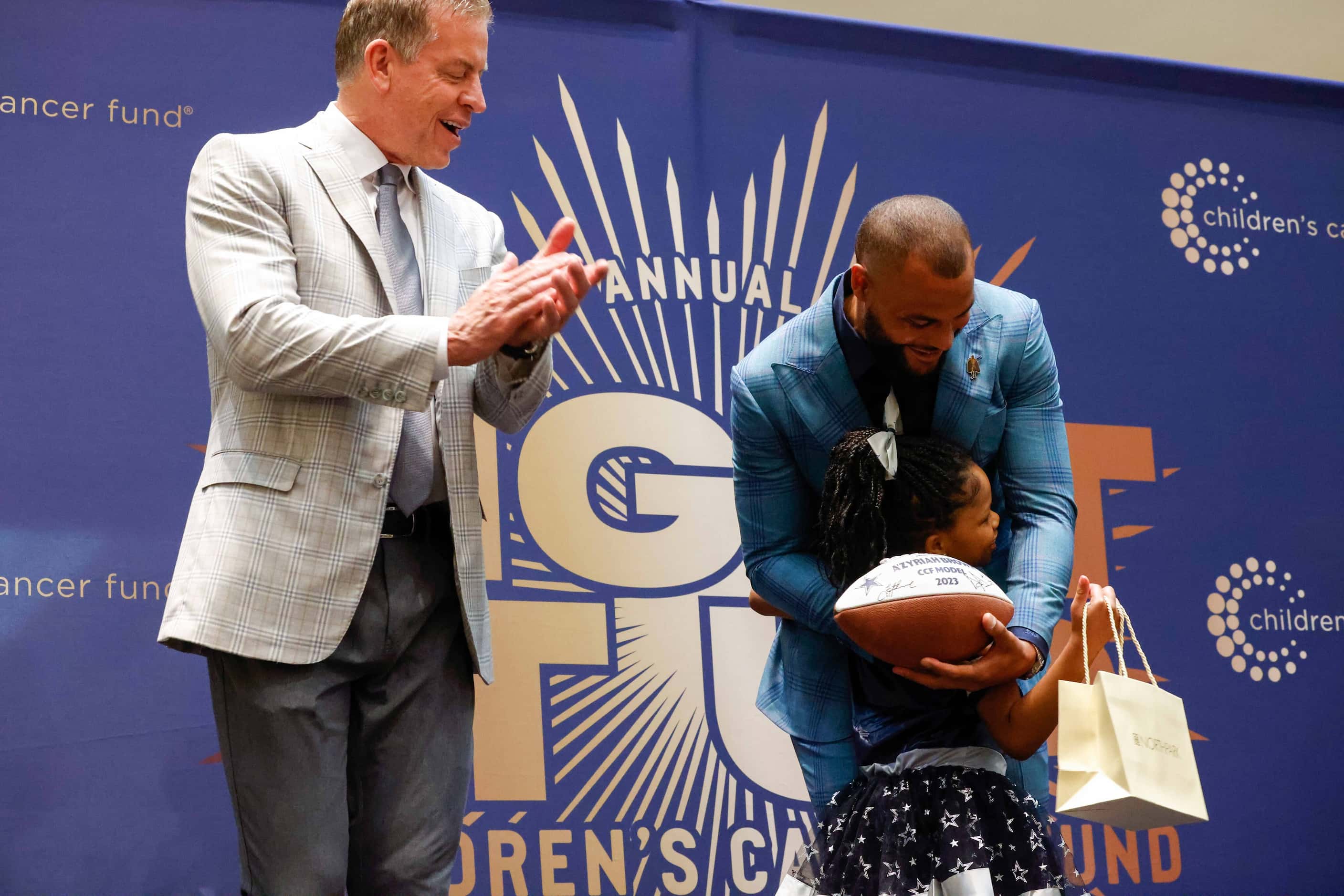 Dallas Cowboys Troy Aikman and Dak Prescott introduce A'zyriah Brown as a model for the...