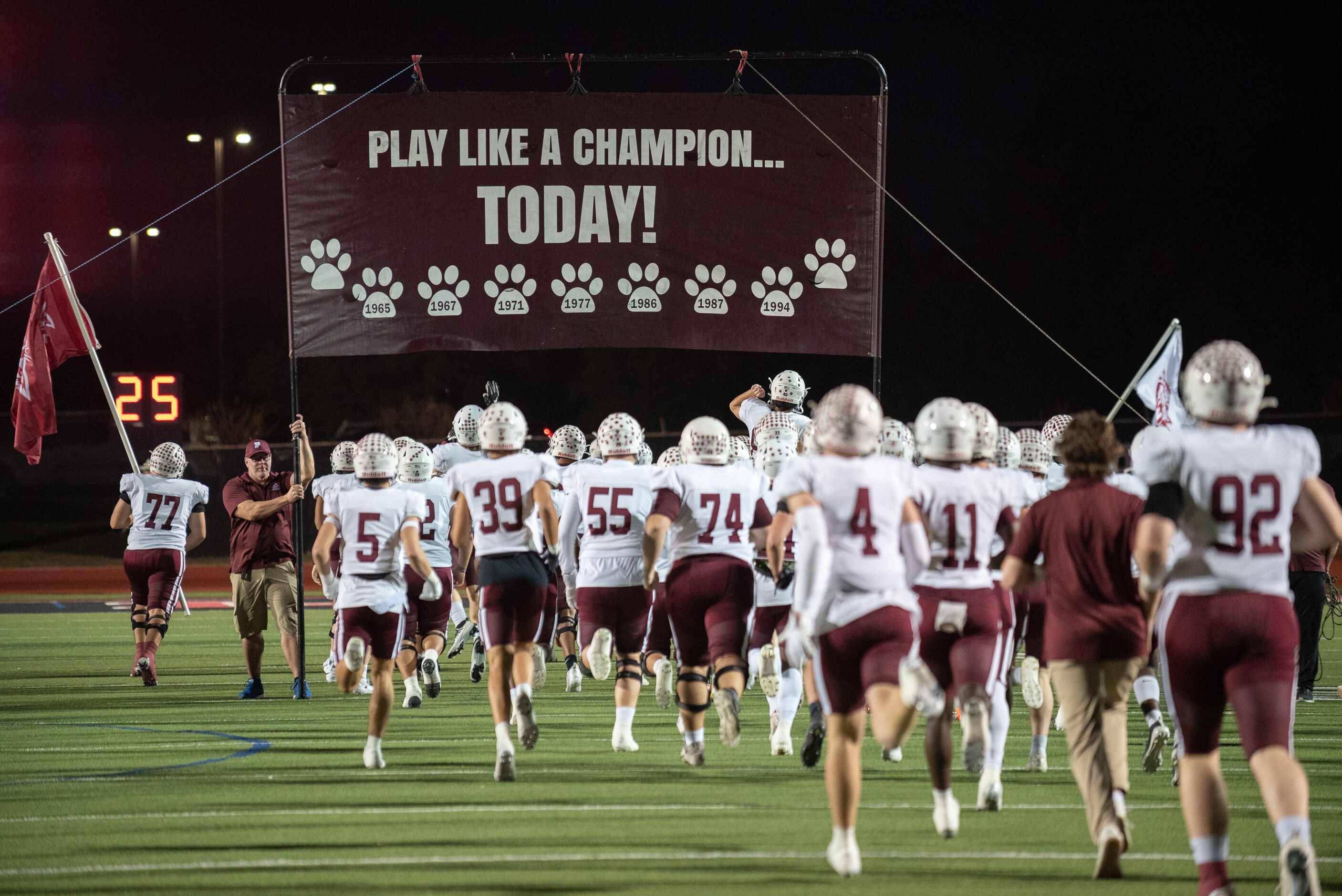 The Plano Wildcats make their entrance for a Thursday night football game versus Coppell at...