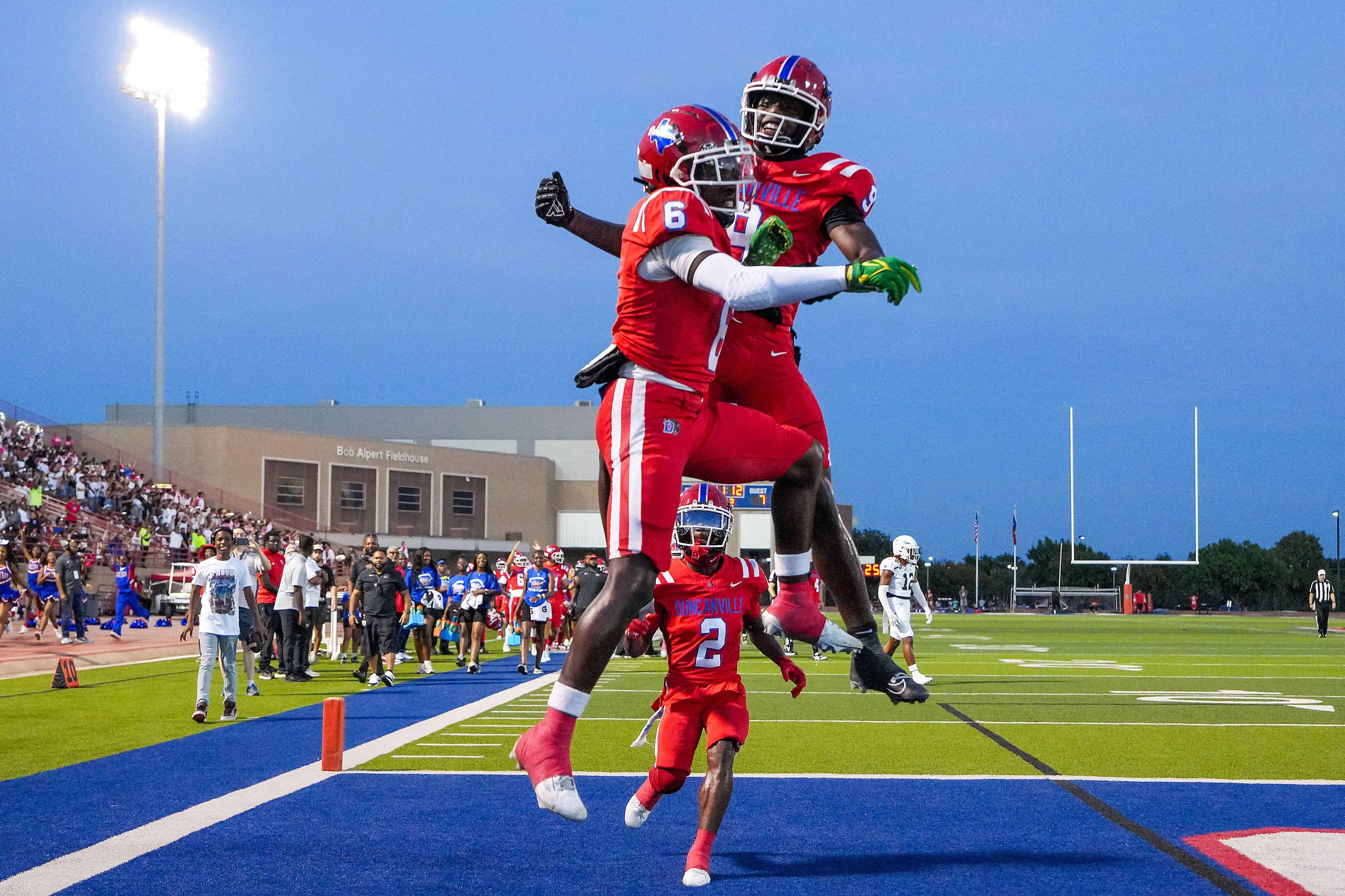 Duncanville wide receiver Trenton Yancey (6) celebrates with Zach Turner (9) and Ayson Theus...