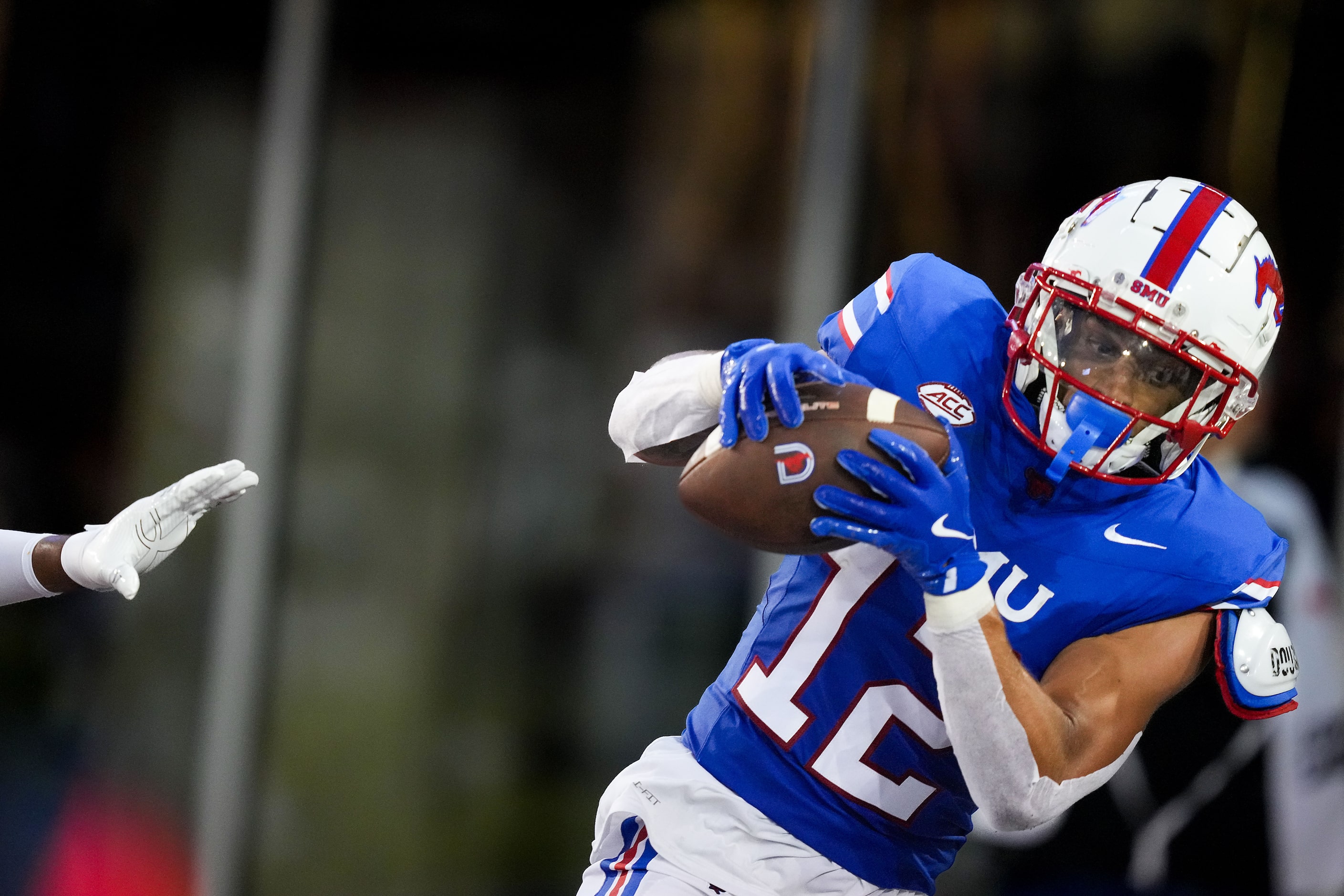 SMU wide receiver Jake Bailey (12) catches a touchdown pass from quarterback Preston Stone...