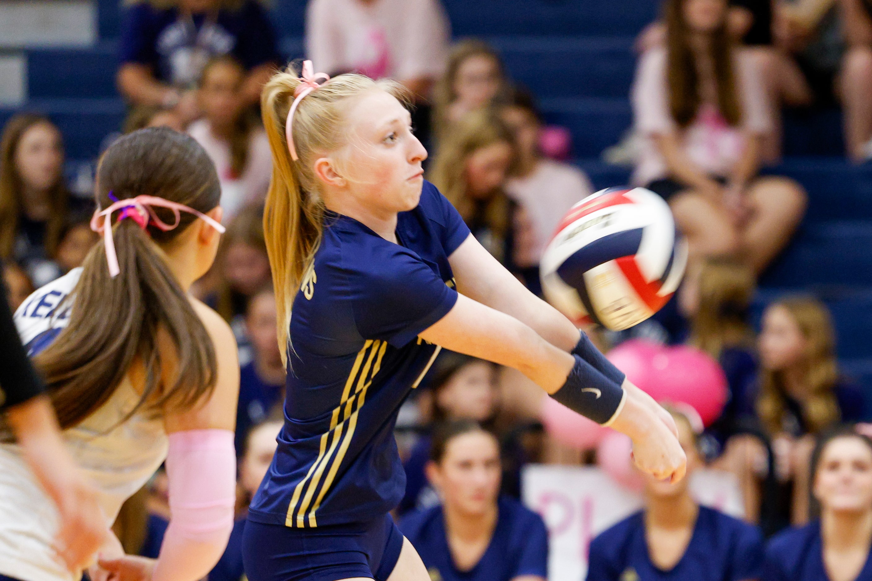 Keller's Maddie Winkler (2) digs the ball during a high school volleyball match against...