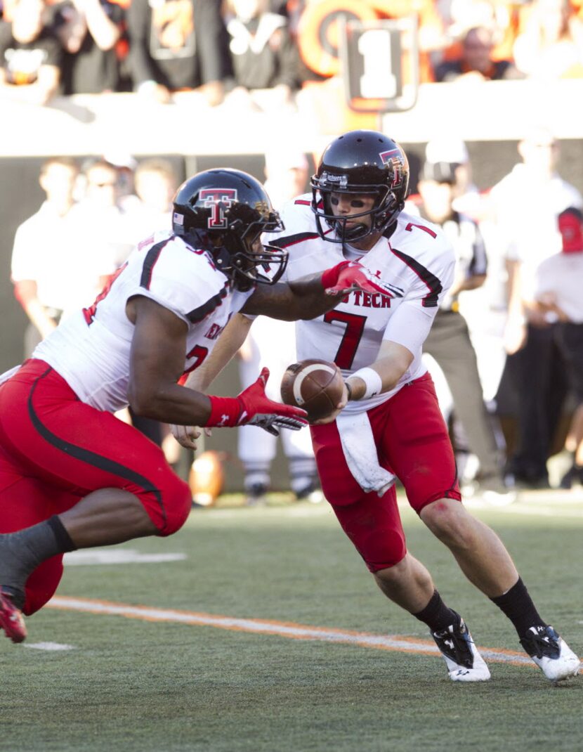 Nov 17, 2012; Stillwater OK, USA; Texas Tech Red Raiders quarterback Seth Doege (7) hands...