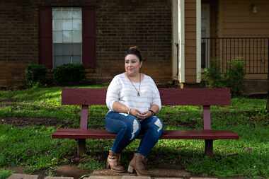 Liz Taylor, photographed outside her home in Euless on May 19, lost her job and was out of...