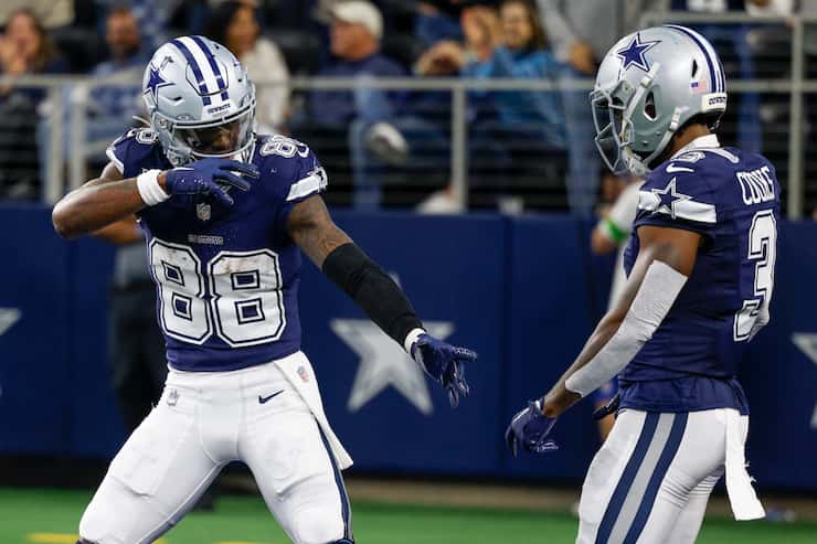 Dallas Cowboys wide receiver CeeDee Lamb (88) celebrates his touchdown reception with wide...