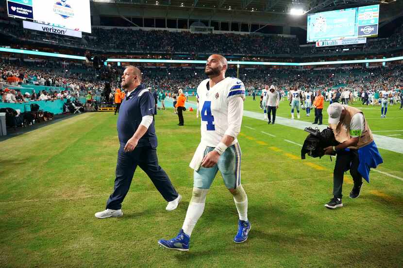 Dallas Cowboys quarterback Dak Prescott (4) leaves the field after a loss to the Miami...