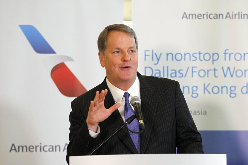 American Airlines CEO Doug Parker marks the occasion before the inaugural American Airlines...