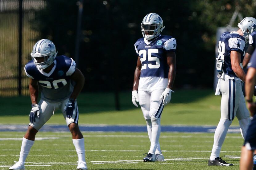 Dallas Cowboys defensive back Xavier Woods (25) waits his turn in the next drill during...