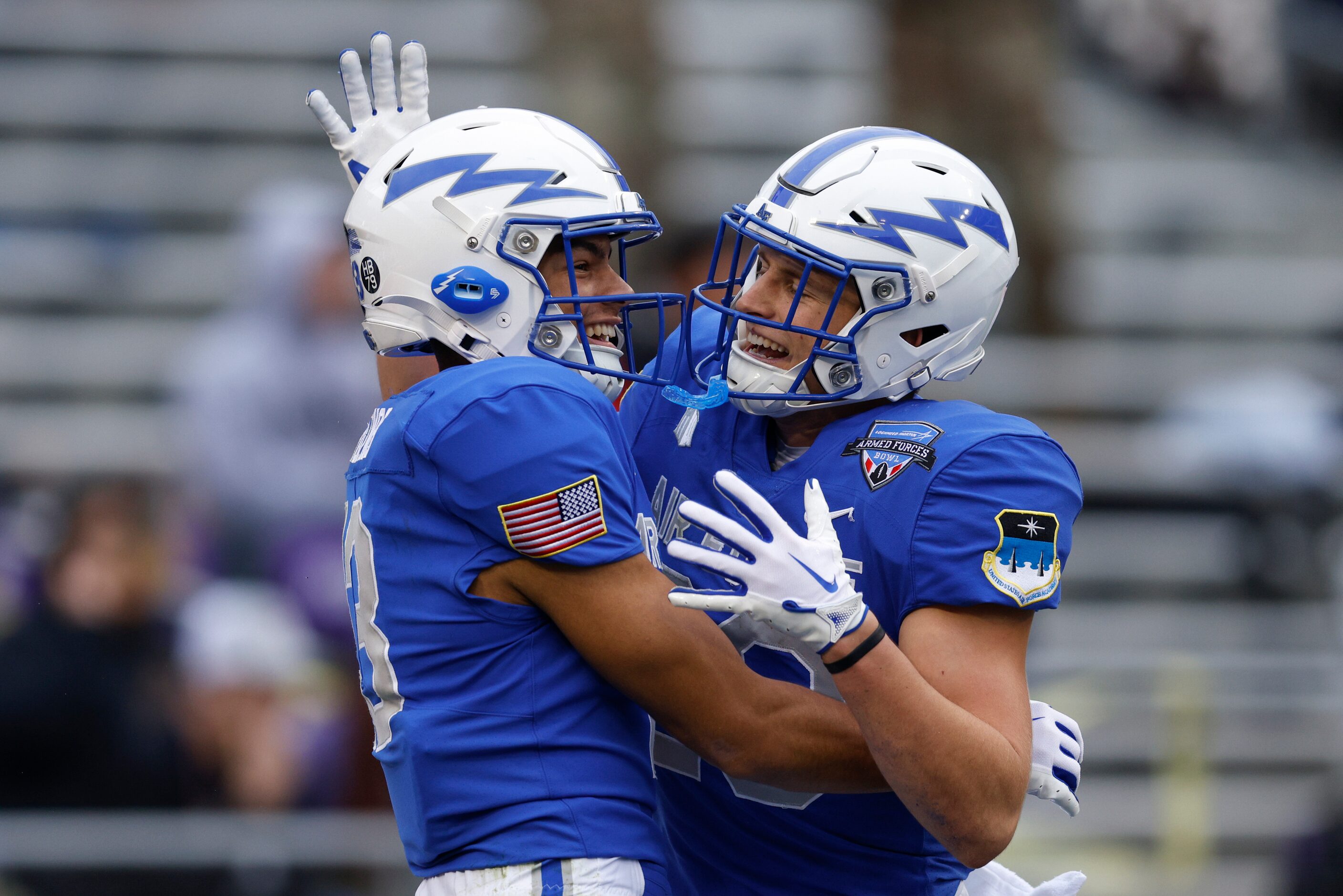 Air Force Falcons wide receiver Jared Roznos (left) celebrates his touchdown with wide...