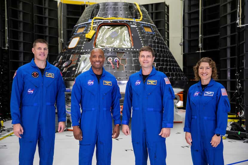 Artemis II crew members, from left, Jeremy Hansen, Victor Glover, Reid Wiseman and Christina...
