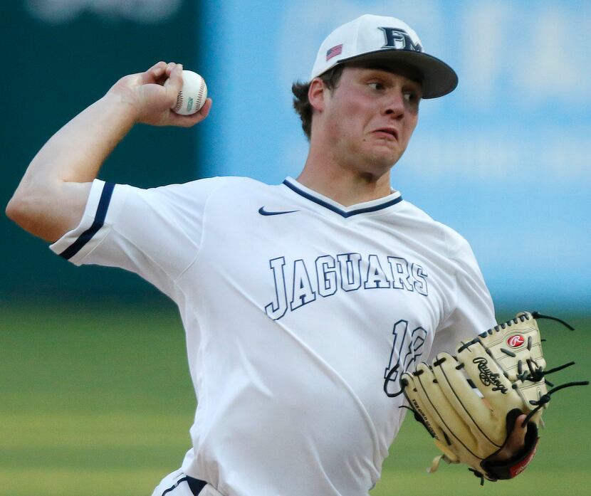 Flower Mound High School pitcher Cam Brown (18) throws a pitch in the first inning as Flower...