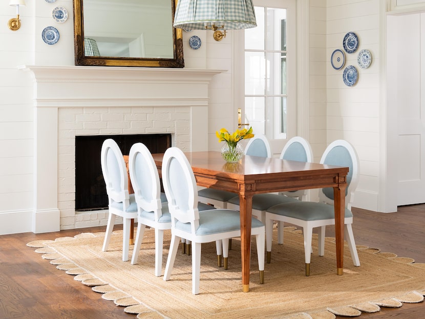 Scout Design's customizable Silvio dining table is shown here with the Emma dining chairs,...