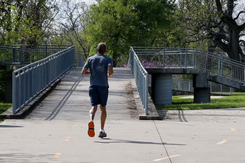 A runner heads out on the trail at Glendale Tuesday, among the newest features at a...