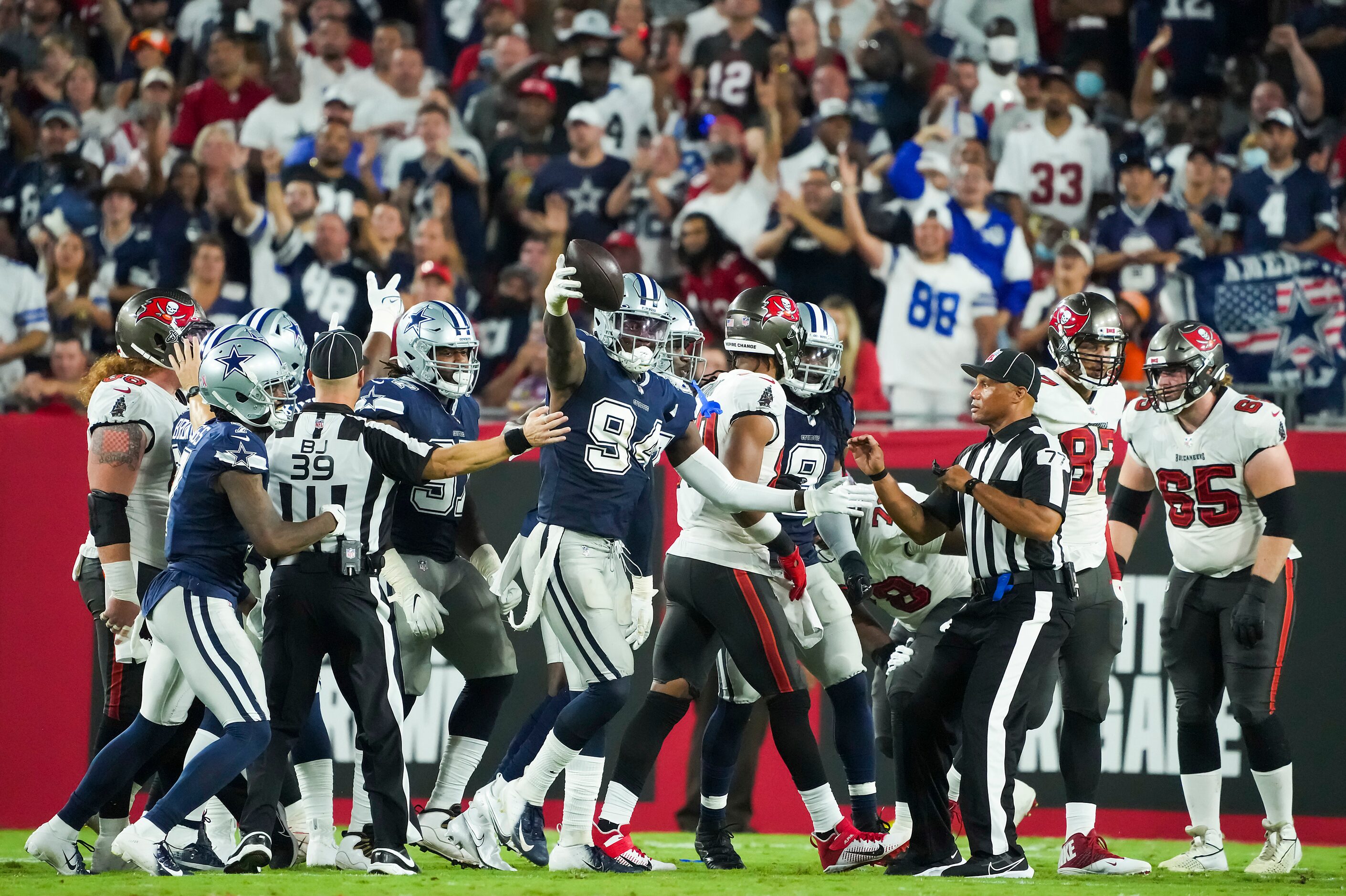 Dallas Cowboys defensive end Randy Gregory (94) celebrates after recovering a fumble during...