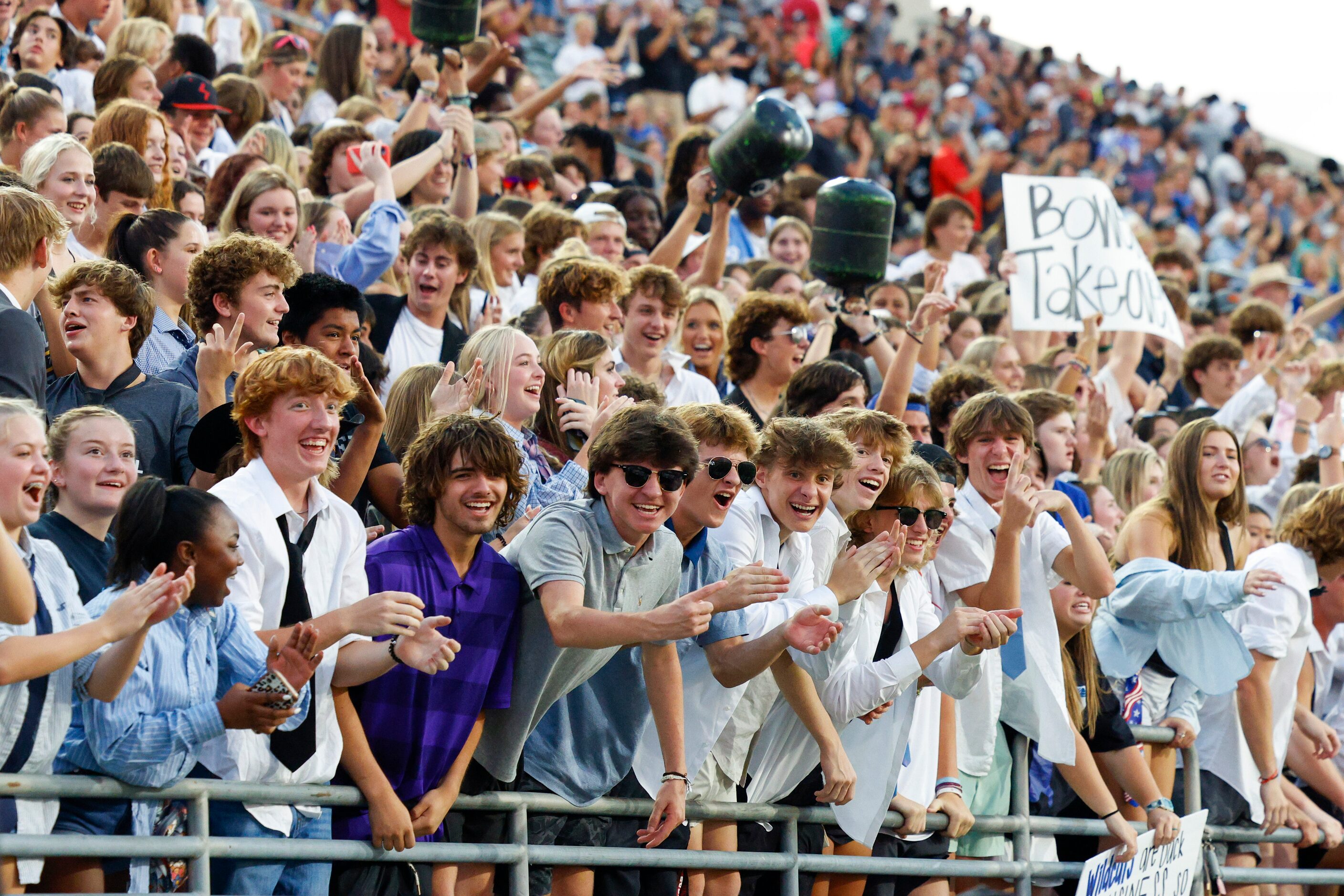 Denton Guyer students celebrate a touchdown by defensive back Eli Bowen (18) during the...