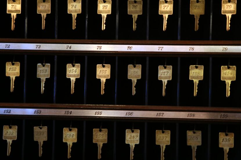 Even though electronic keys are now in use at the Adolphus Hotel, the old-style keys are...