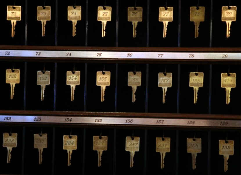 Even though electronic keys are now in use at the Adolphus Hotel, the old-style keys are...