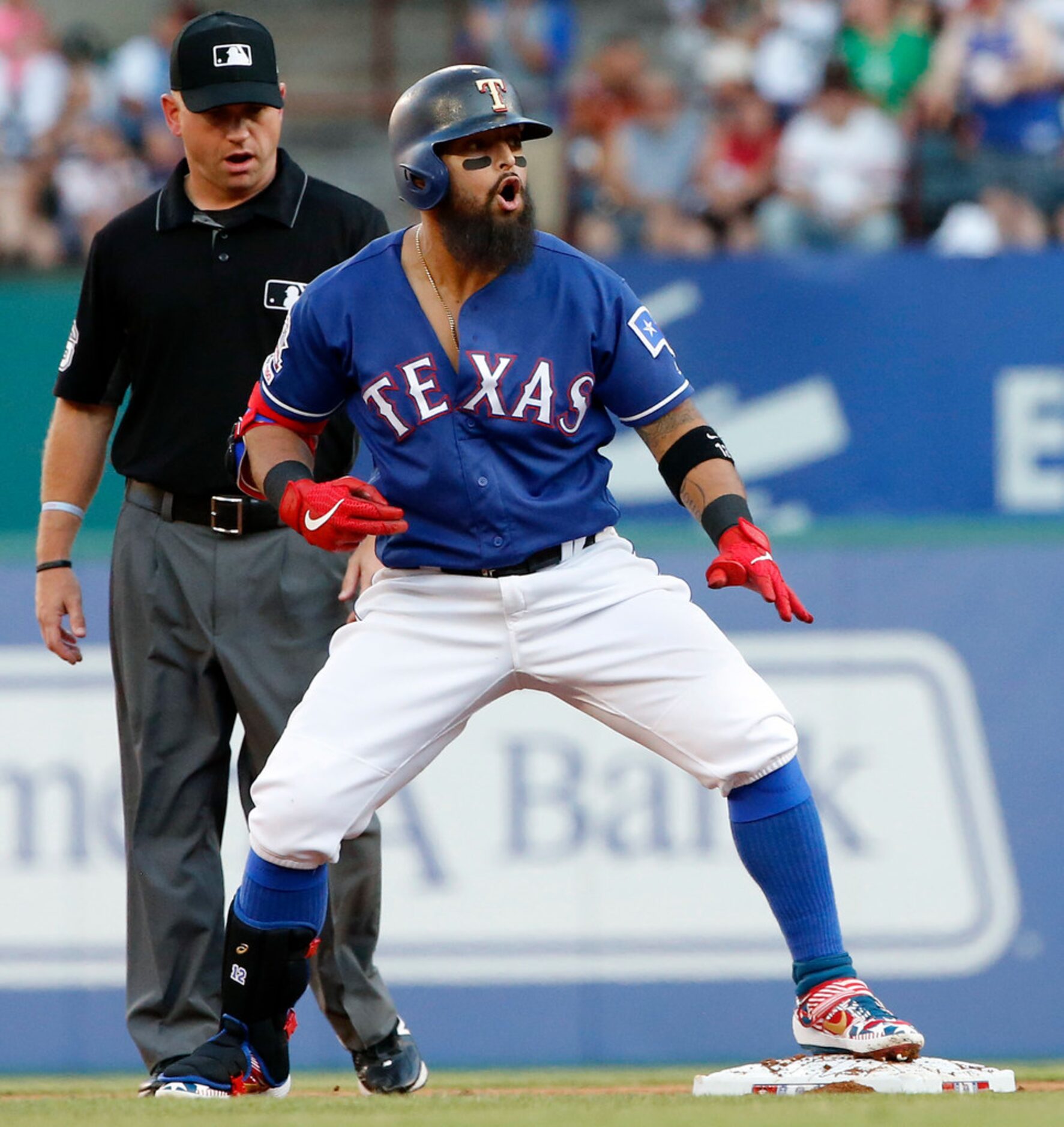 Texas Rangers second baseman Rougned Odor (12) celebrates his his first inning double...