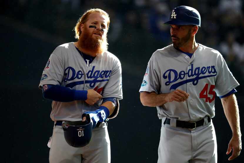 MILWAUKEE, WI - OCTOBER 13:  Justin Turner #10 of the Los Angeles Dodgers talks with third...