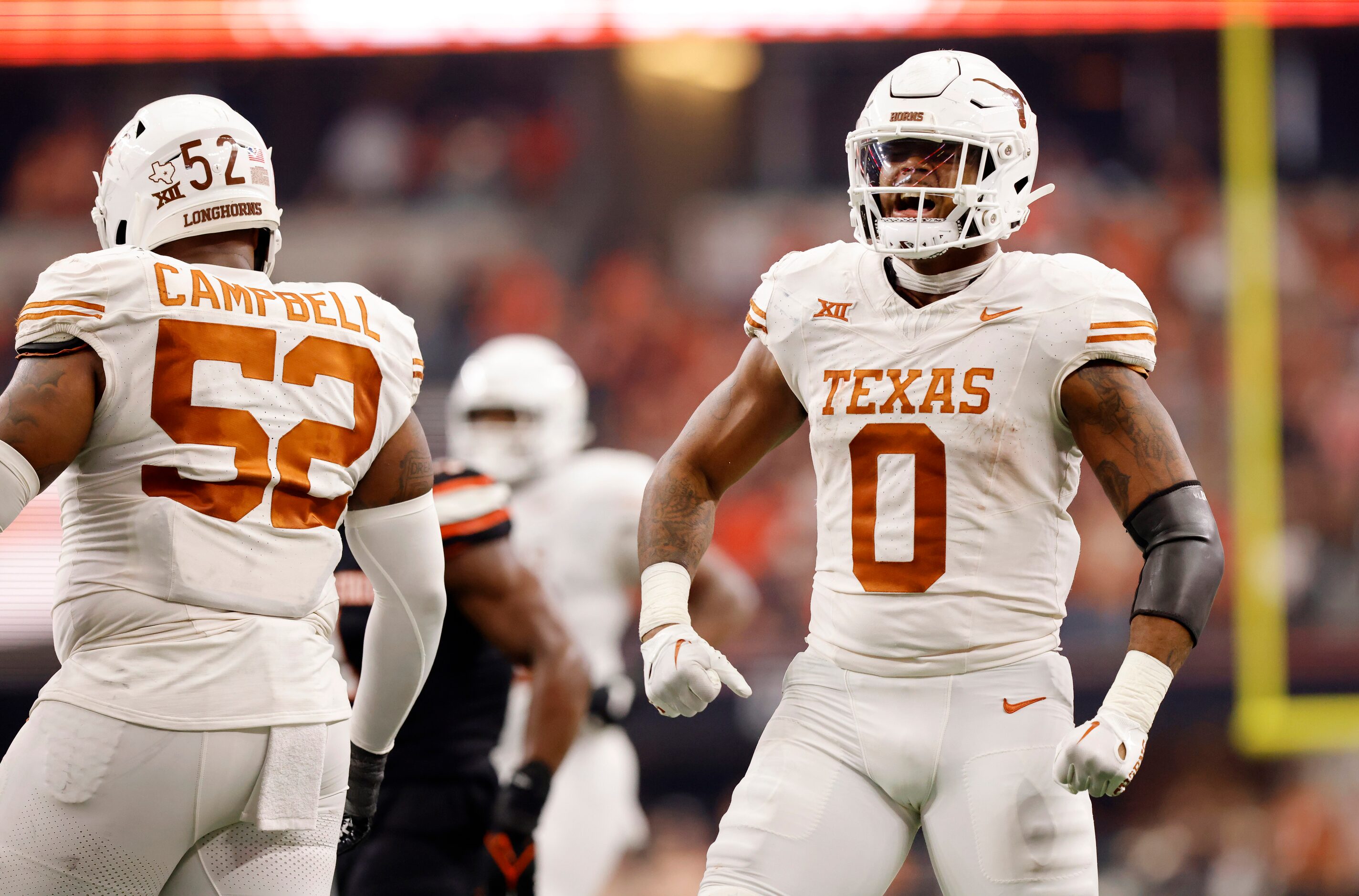 Texas Longhorns tight end Ja'Tavion Sanders (0) exhaults after his big second quarter catch...