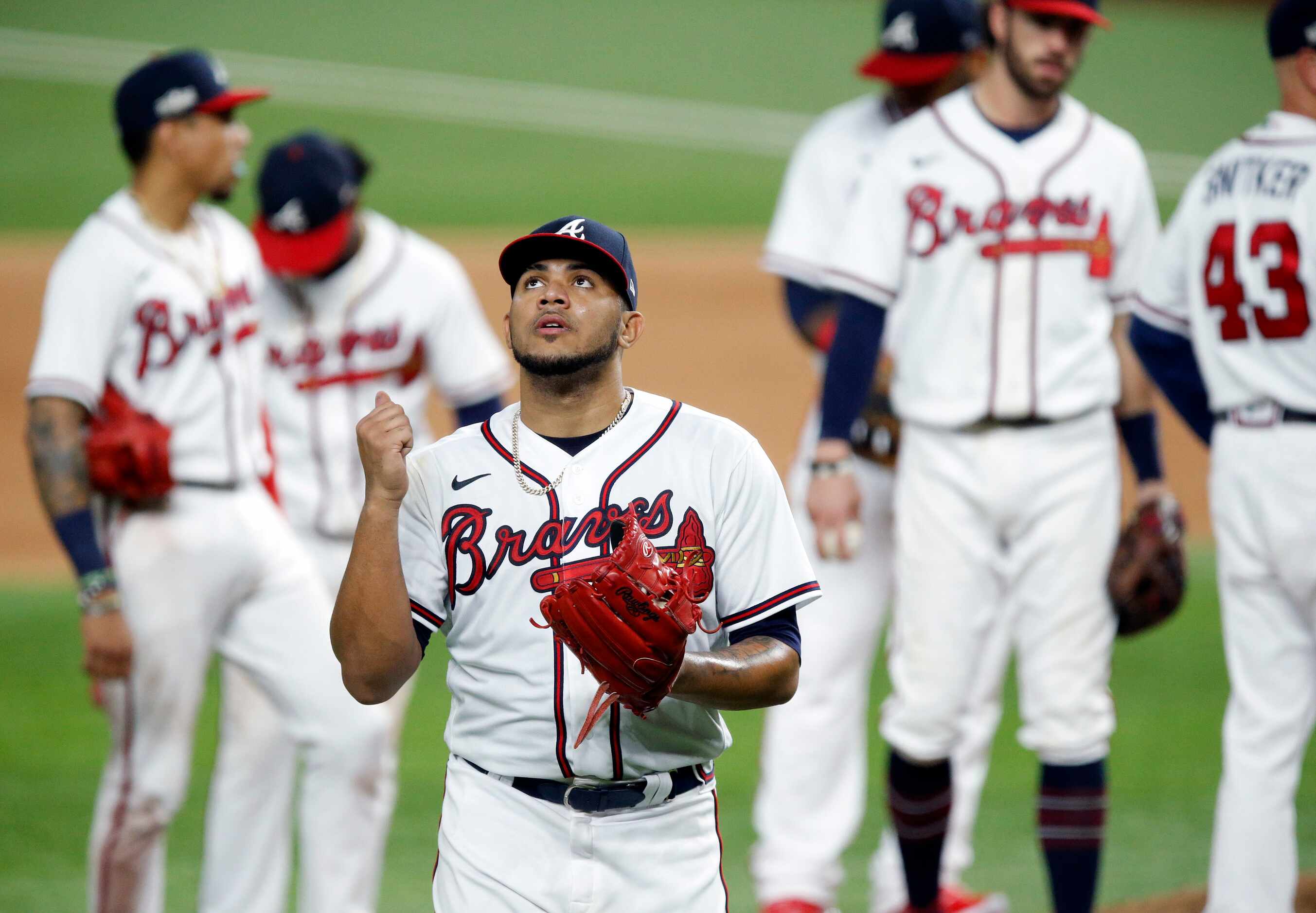 Atlanta Braves relief pitcher Huascar Ynoa (73) walks to the dugout after being pulled...