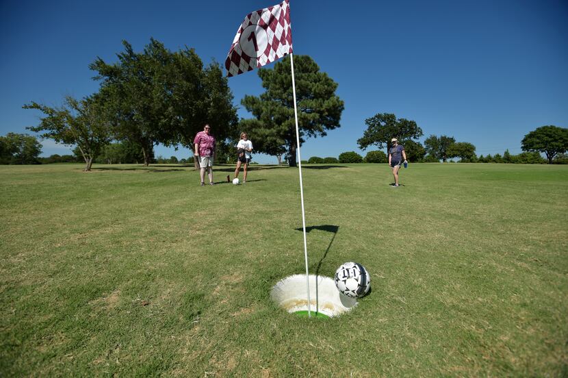 A group playing foot golf at the Texas Woman's University Pioneer Golf Course