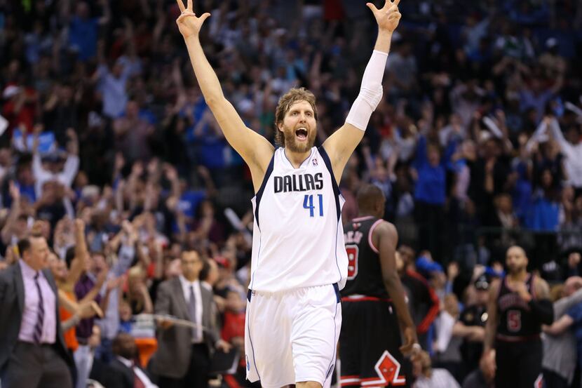 Mar 30, 2013; Dallas, TX, USA; Dallas Mavericks power forward Dirk Nowitzki (41) celebrates...