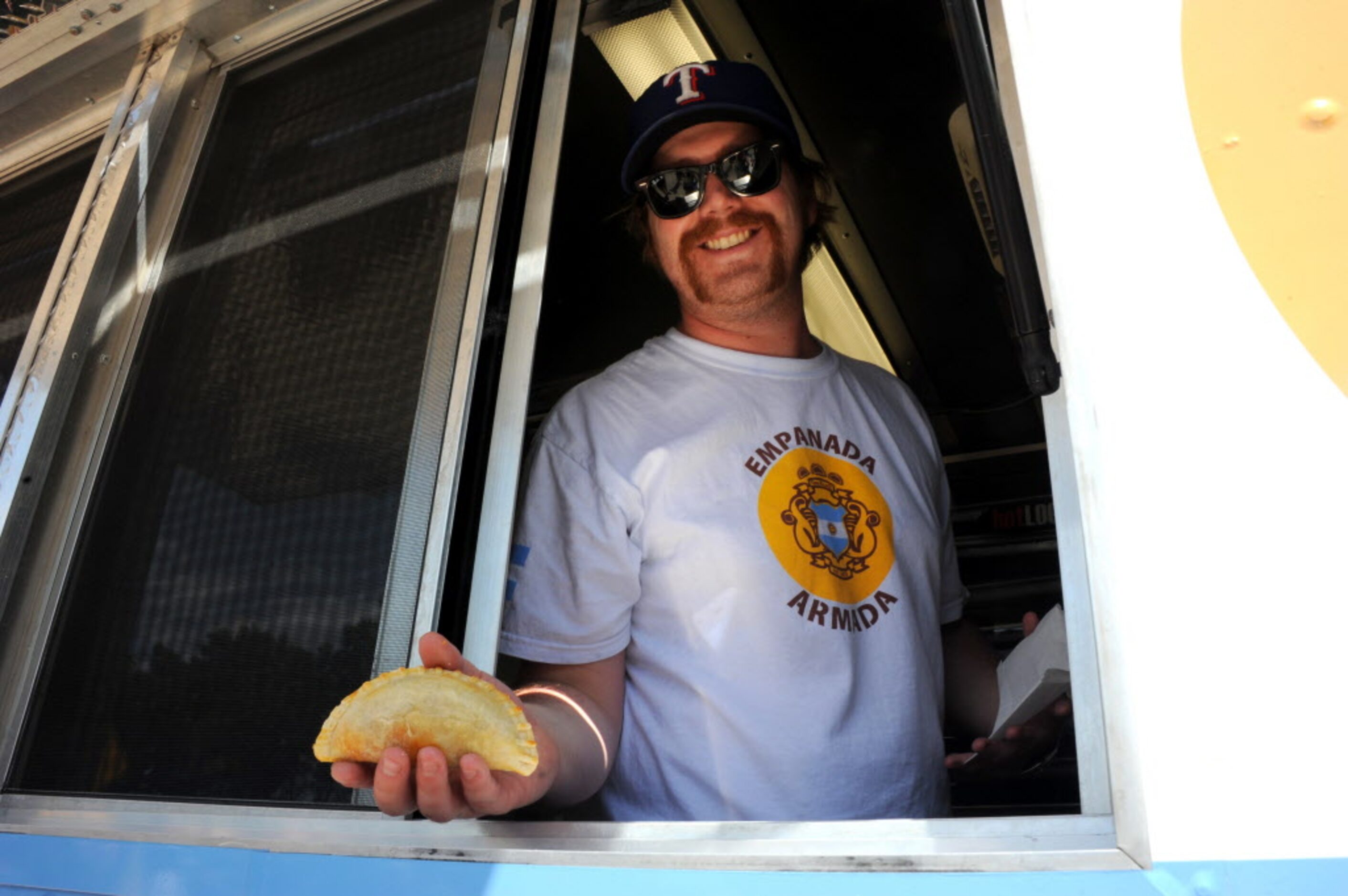 Bayne Renyolds from Dallas with the delicious Empanada Armada truck at the Food Truck...