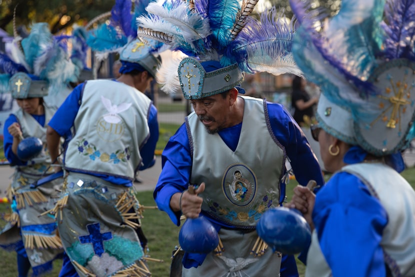 Dancers with the group Danza San Juan Diego perform at the "Mundo Latino" exhibit at the...